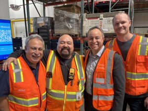 David with co-workers, Mike, CEO, Casey, and Ian