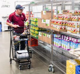 Nonprofit partner selecting items from a food pantry