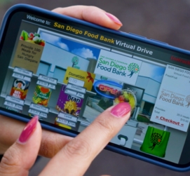 Someone donating food virtually through our Virtual Food Drive platform.