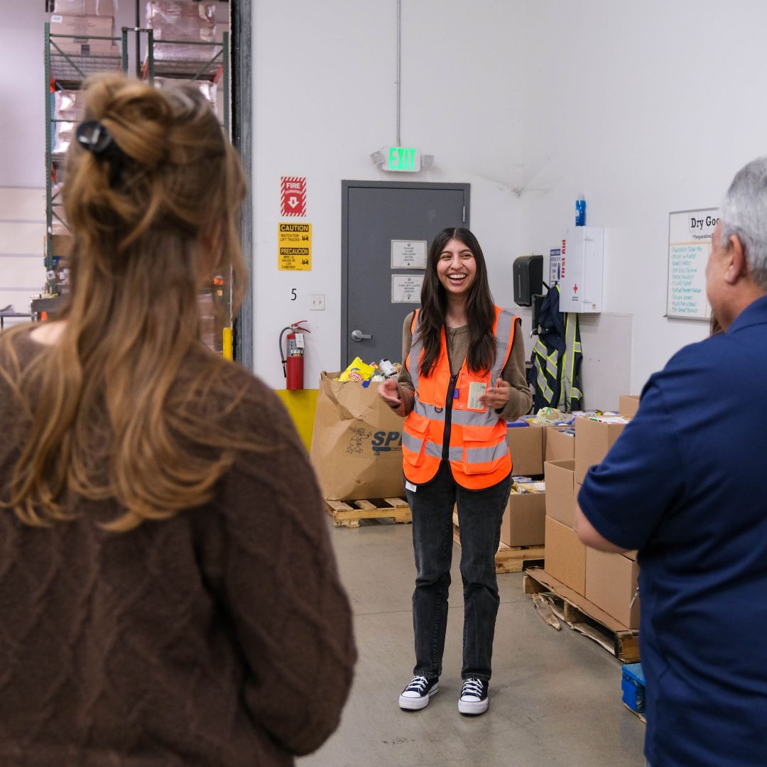 A staff member leading a tour at our warehouse.