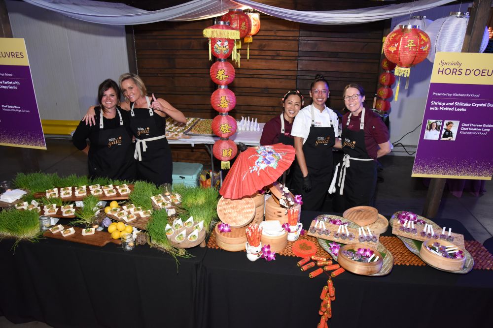 Chefs showing off their creations.