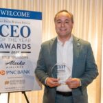 Casey Castillo accepts his 2026 CEO of the Year award at the San Diego Business Journal recognition ceremony.