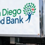 A 26-foot refrigerated truck with San Diego Food Bank branding