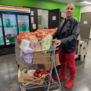 Carmello with a cart full of food.
