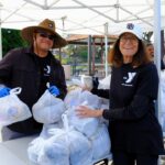 Volunteers help out at sites throughout the county, including ASYMCA and the Food Bank's North County location in Vista.